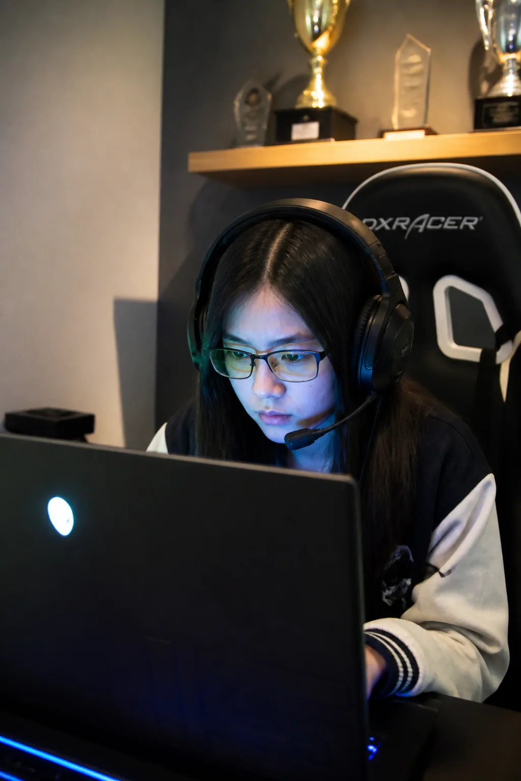 Asian girl in competitive gaming session